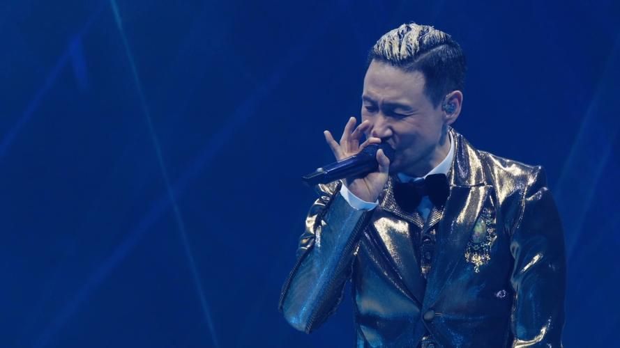 张学友经典吻别英文版现场演唱视频